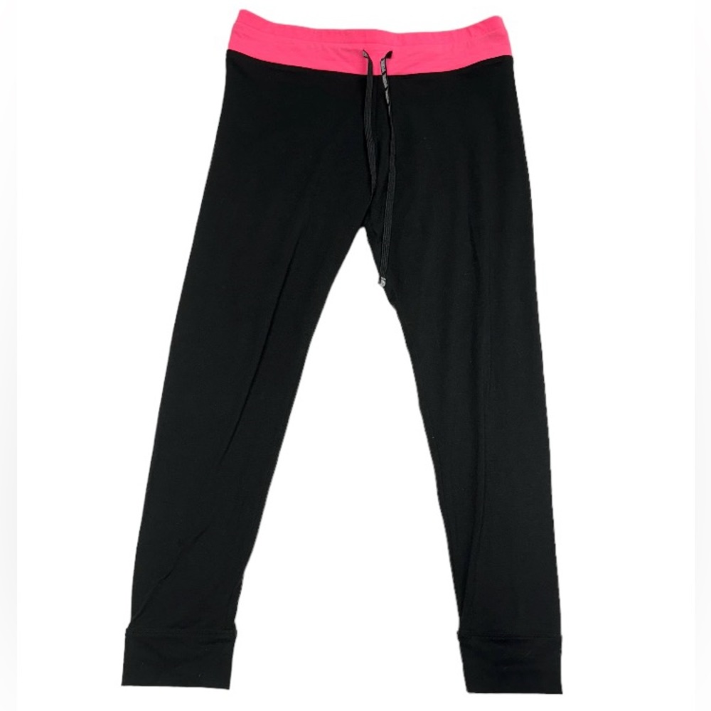 PINK Victoria’s Secret size large leggings with pink colored top waistband.